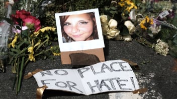 Flowers and a photo of car ramming victim Heather Heyer lie at a makeshift memoriall in Charlottesville, Virginia,  August 13, 2017.