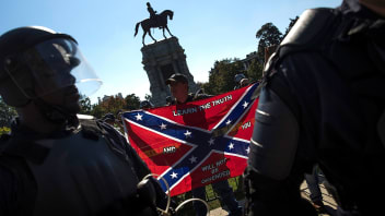 Richmond police keep members of the Tennessee based group 'New Confederate State of America' separated from counter protesters September 16, 2017 in Richmond, Virginia. The group held a protest in support of retaining the statue of Confederate Gen. Robert E. Lee that is located on Richmond's Monument Avenue.