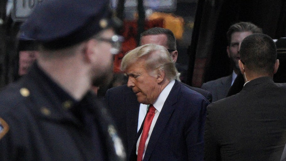 Former U.S. President Donald Trump and his son Eric Trump arrive at Trump Tower