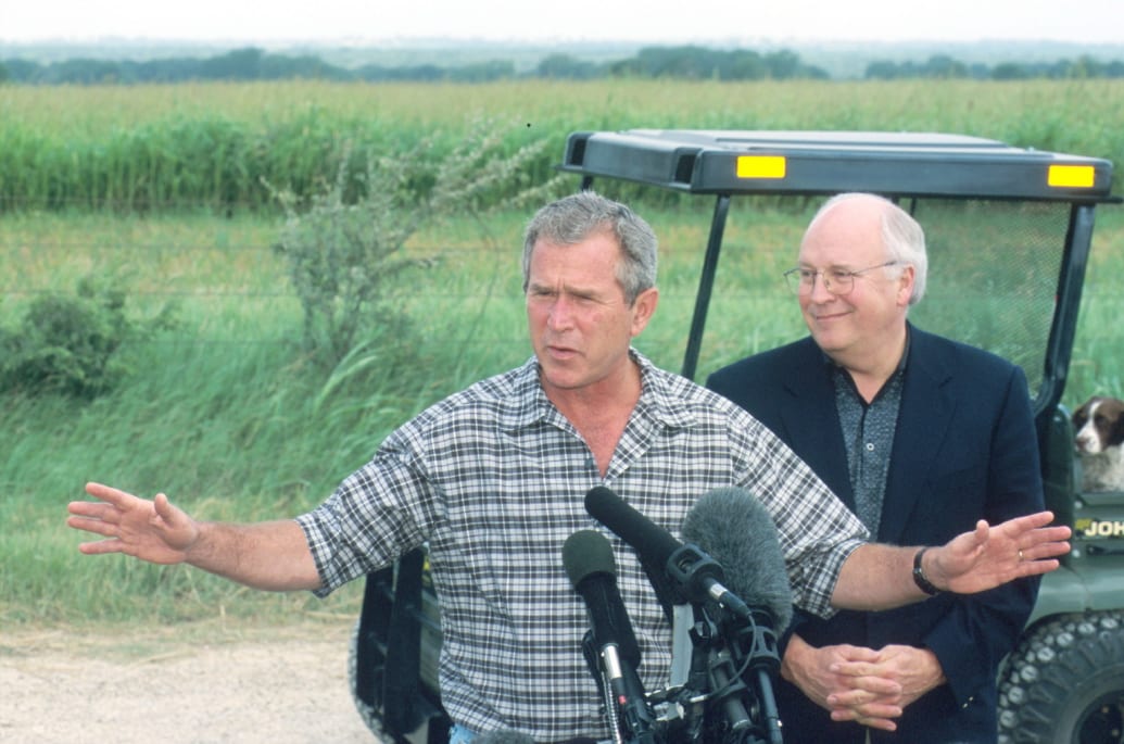 George W. Bush speaks with the media with Dick Cheney.