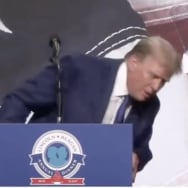 Donald Trump wobbles on stage