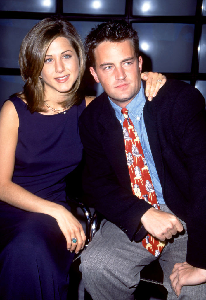 Jennifer Aniston and Matthew Perry pose together in 1995 as stars of the TV hit "Friends."