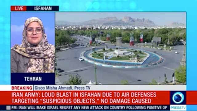 Press TV presenter smirking at the Israeli attack on Iran.