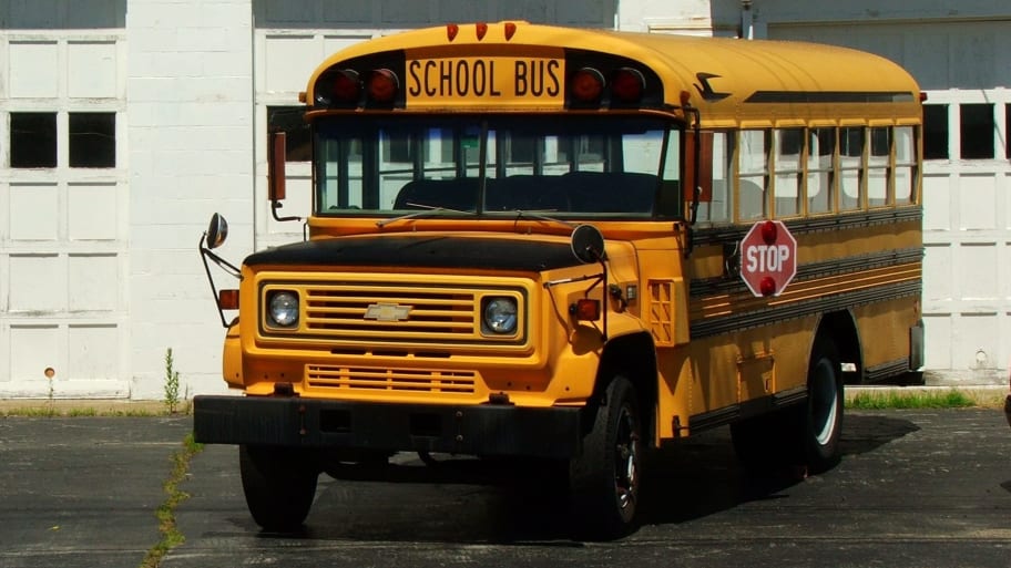 A photograph of a retired school bus in New London County, Connecticut.