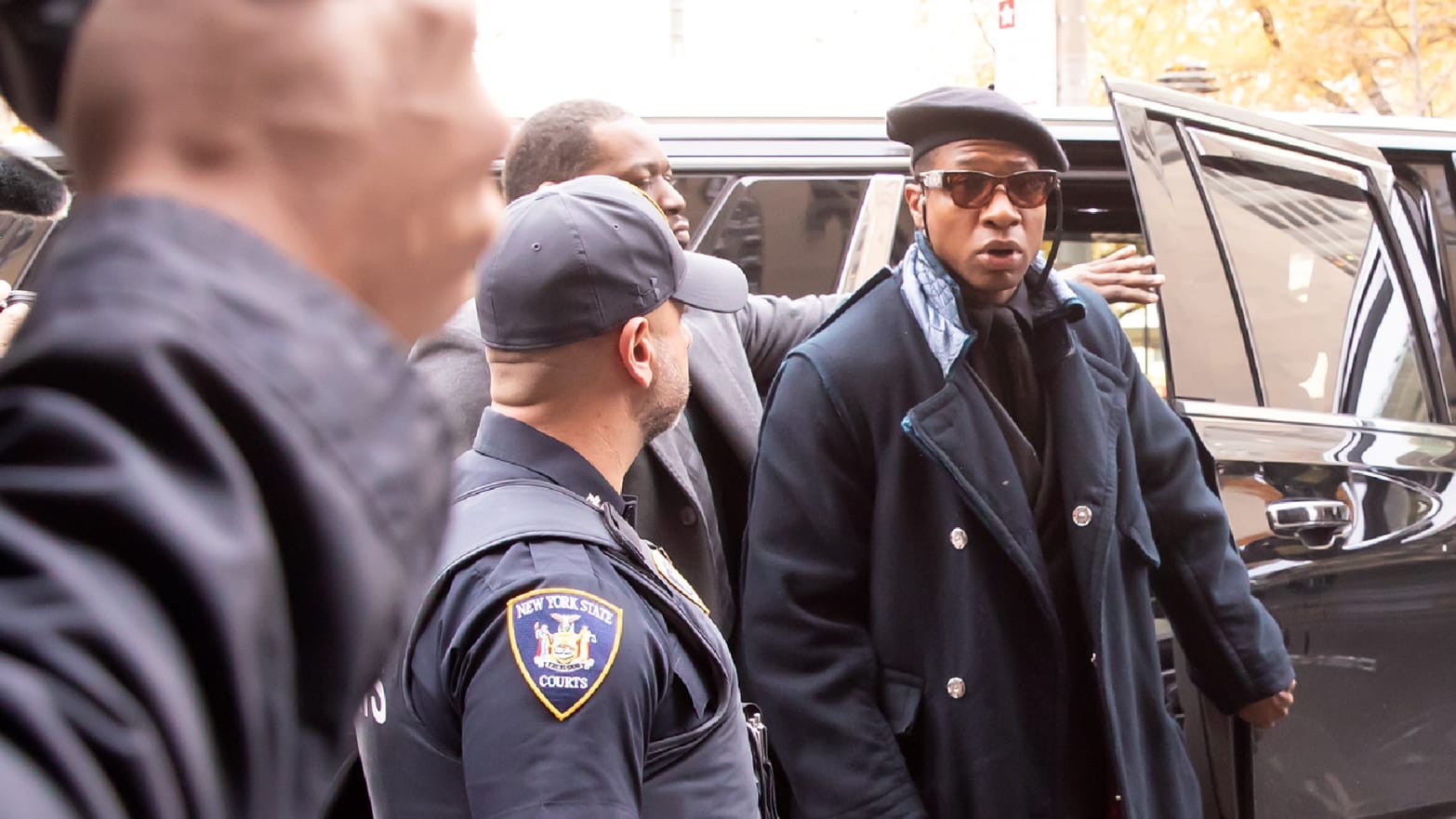 Jonathan Majors and Meagan Good are seen arriving at court on December 4, 2023 in New York, New York. 