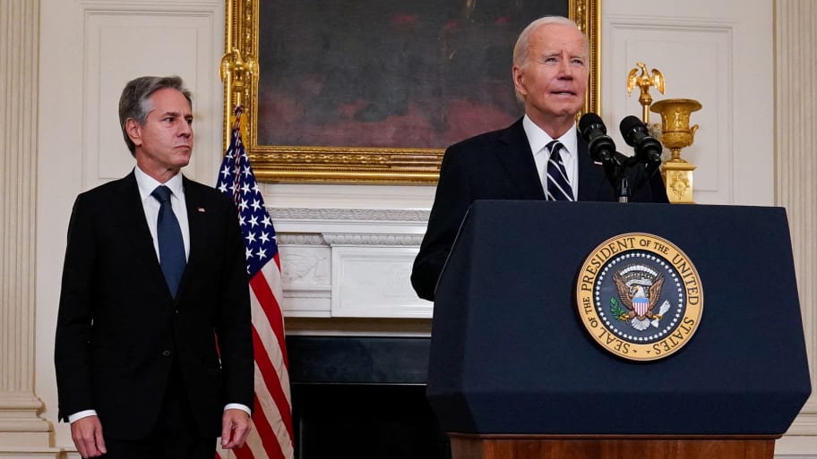 U.S. President Joe Biden, flanked by U.S. Secretary of State Antony Blinken