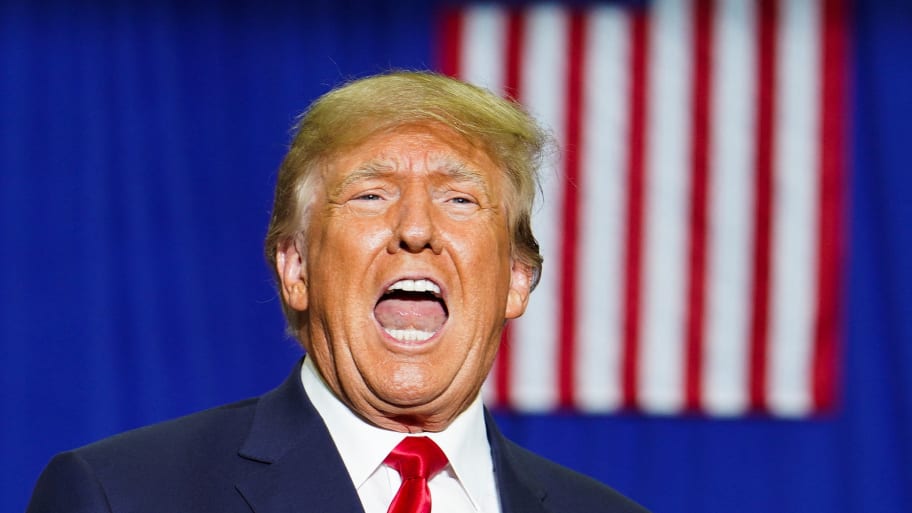 Former U.S. President Donald Trump reacts as he attends a rally in Warren, Michigan, U.S., October 1, 2022.  
