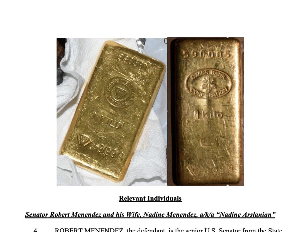 A snippet of the indictment against Bob Menendez, showing two gold bars found in his home.