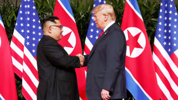U.S. President Donald Trump shakes hands with North Korean leader Kim Jong Un at the Capella Hotel on Sentosa island in Singapore June 12, 2018. REUTERS/Jonathan Ernst - RC1BF3A56C10