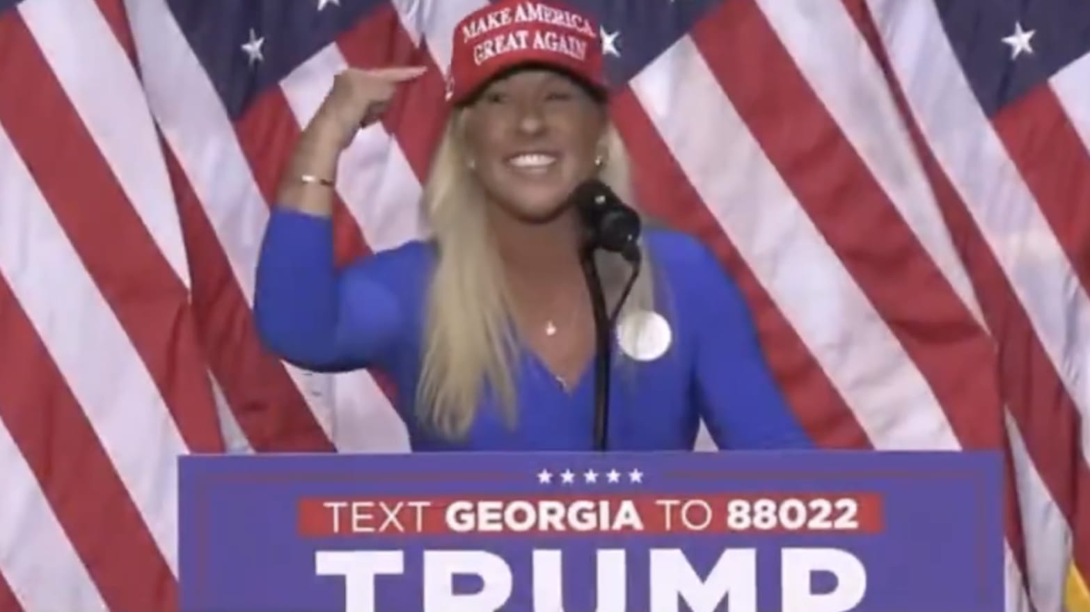 Marjorie Taylor Greene speaks at a Donald Trump rally in Georgia. 