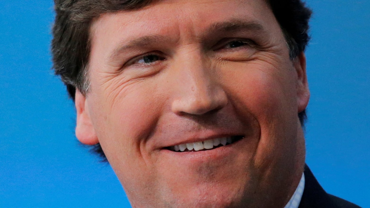 Fox personality Tucker Carlson speaks at a 2017 conference.