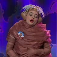 Sarah Sherman dressed as a worm on Saturday Night Live. 