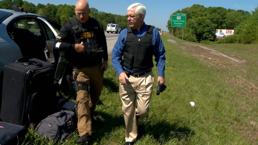 A photograph of Phil Williams following a drug interdiction agent in 2011 as part of his duPont Award-winning investigation of Tennessee's civil asset forfeiture program.