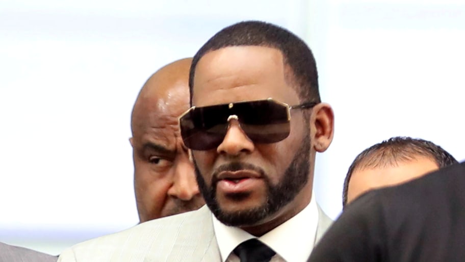 R. Kelly walks inside the Criminal Court Building as he arrives for a hearing on eleven new counts of criminal sexual abuse, in Chicago, Illinois, U.S., June 6, 2019.