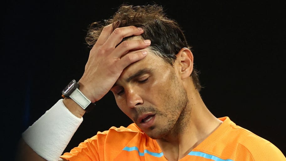 Rafael Nadal looks dejected after losing his second round match against Mackenzie Mcdonald of the Australian Open in Melbourne, Australia, Jan. 18, 2023.