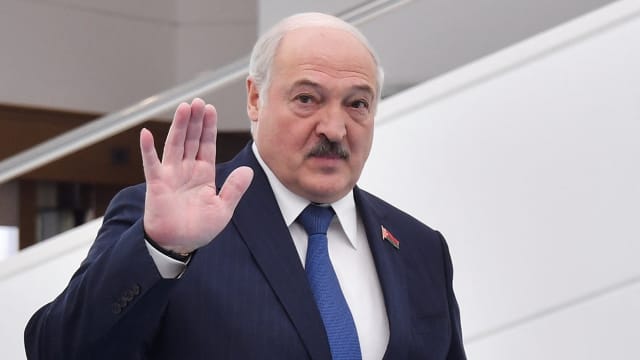 Belarusian President Alexander Lukashenko waves