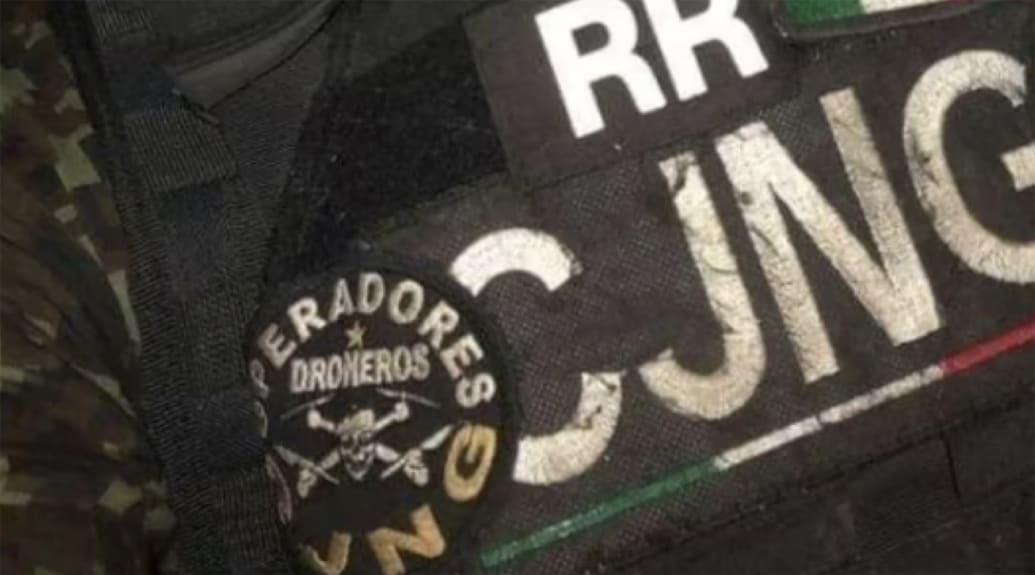 A member of the Jalisco New Generation Cartel wearing a drone operators unit patch.