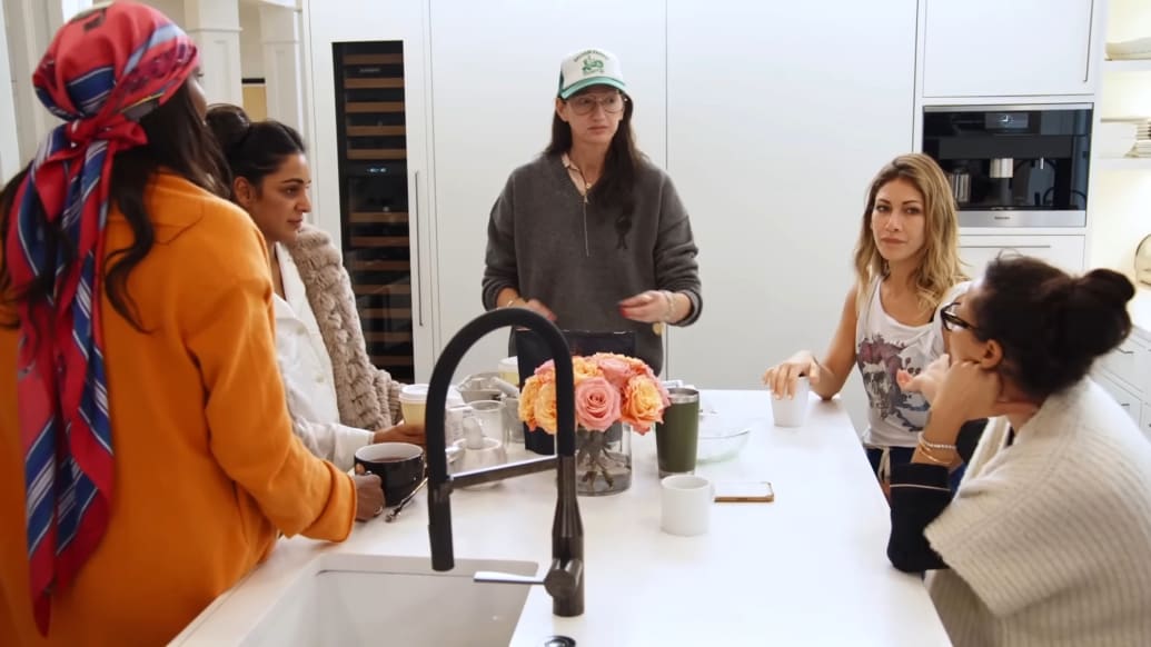 A photo still of Ubah Hassan, Jessel Taank, Erin Lichy, Jenna Lyons, and Sai De Silva in the third episode of RHONY.