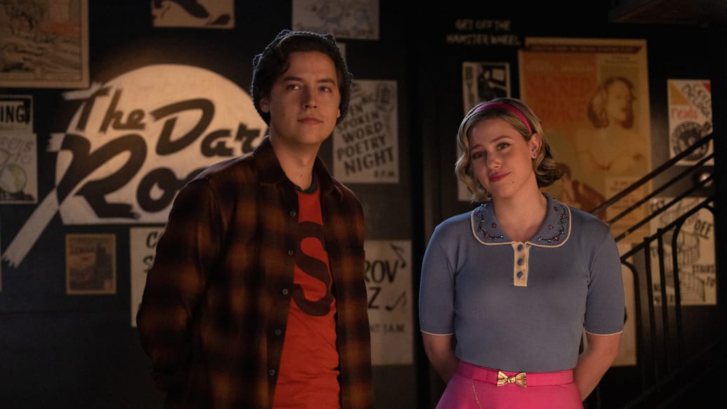 Cole Sprouse as Jughead Jones and Lili Reinhart as Betty Cooper in Riverdale.