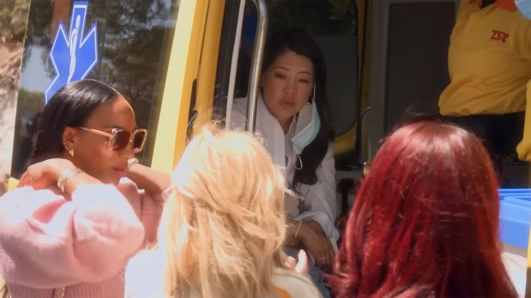 Crystal Kung Minkoff gets in an ambulance.