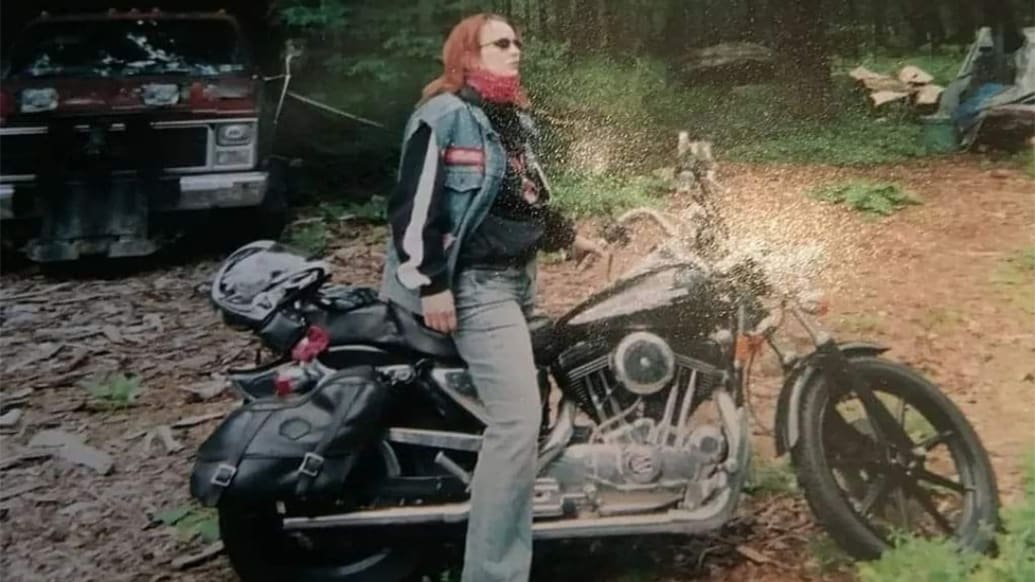 A photograph of Lisa Roberts on a motorcycle.