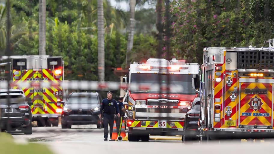 Emergency crews respond to a fire at the home of Miami Dolphins wide receiver Tyreek Hill on Wednesday.