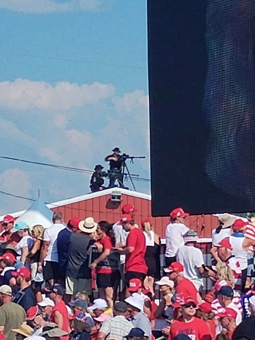 Secret Service snipers on a rooftop