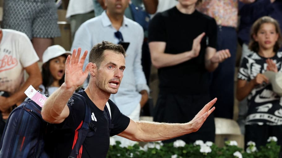 Andy Murray of Britain reacts after losing his match at Paris Olympics