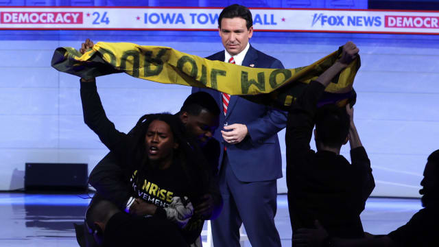 Protesters interrupt Republican presidential candidate Florida Governor Ron DeSantis during a Fox News Town Hall.