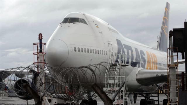 A photo of an Atlas Air 747 on the tarmac.