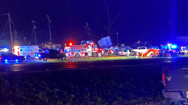 Emergency vehicles responding to tornado damage in Silver City, Mississippi.