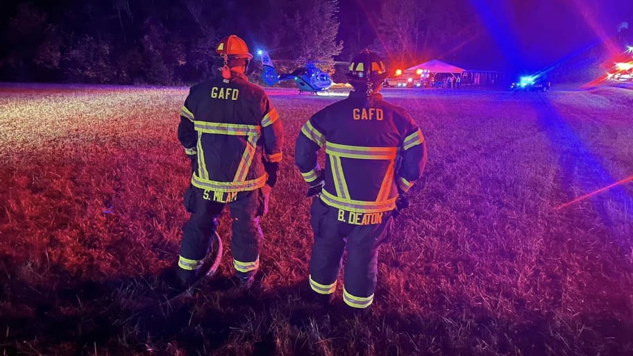Firefighters at the scene of a shooting of a pastor’s son, 2, in Morganton, North Carolina. 