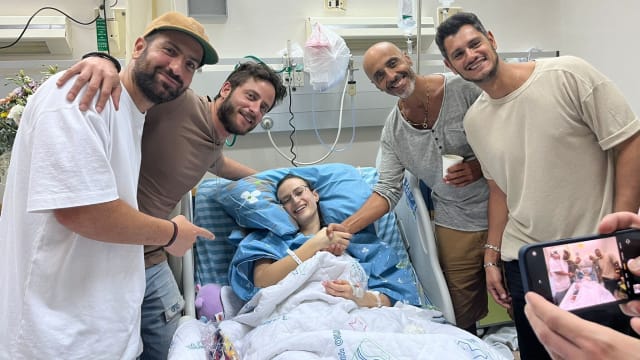 A photo of 23-year-old terror survivor Tamar Kam in a hospital bed in Be'er Sheva, Israel.