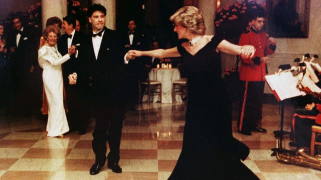 John Travolta dances with Princess Diana inside a White House ballroom.