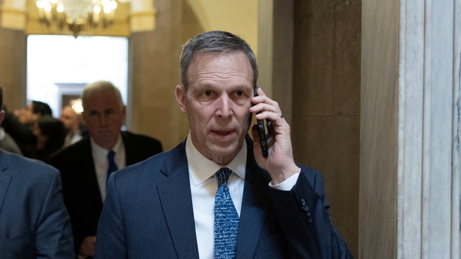 Rep. Scott Perry (R-PA) uses a cellphone while walking to the House Chamber on Capitol Hill in Washington, D.C., Feb. 2, 2023.