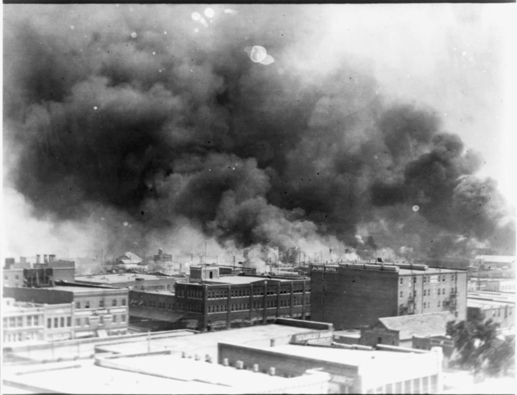 Smoke billowing over Tulsa, Oklahoma during 1921 race massacre