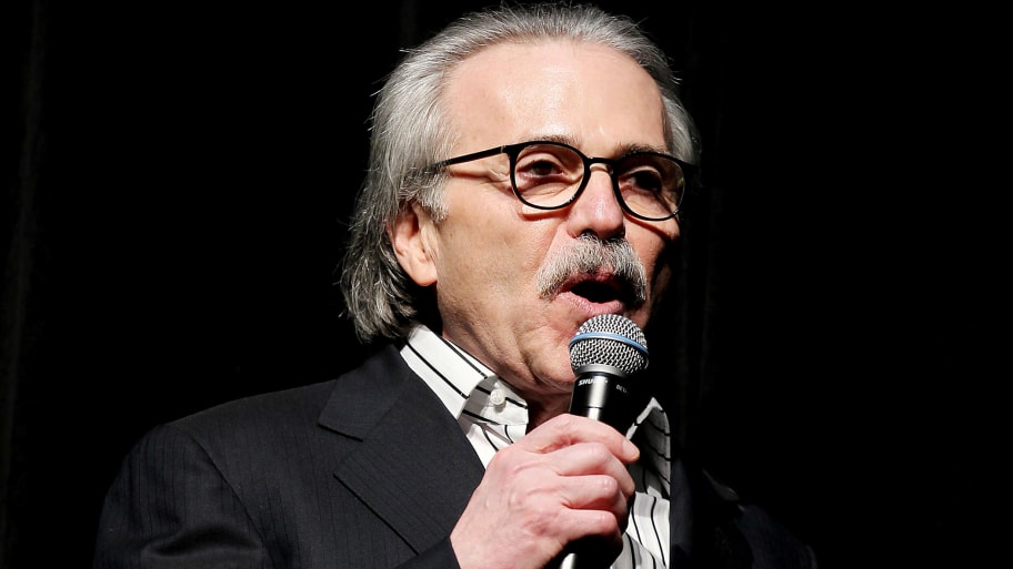 David Pecker, Chairman and CEO of American Media speaks at the Shape and Men's Fitness Super Bowl Party in New York City, U.S., January 31, 2014.