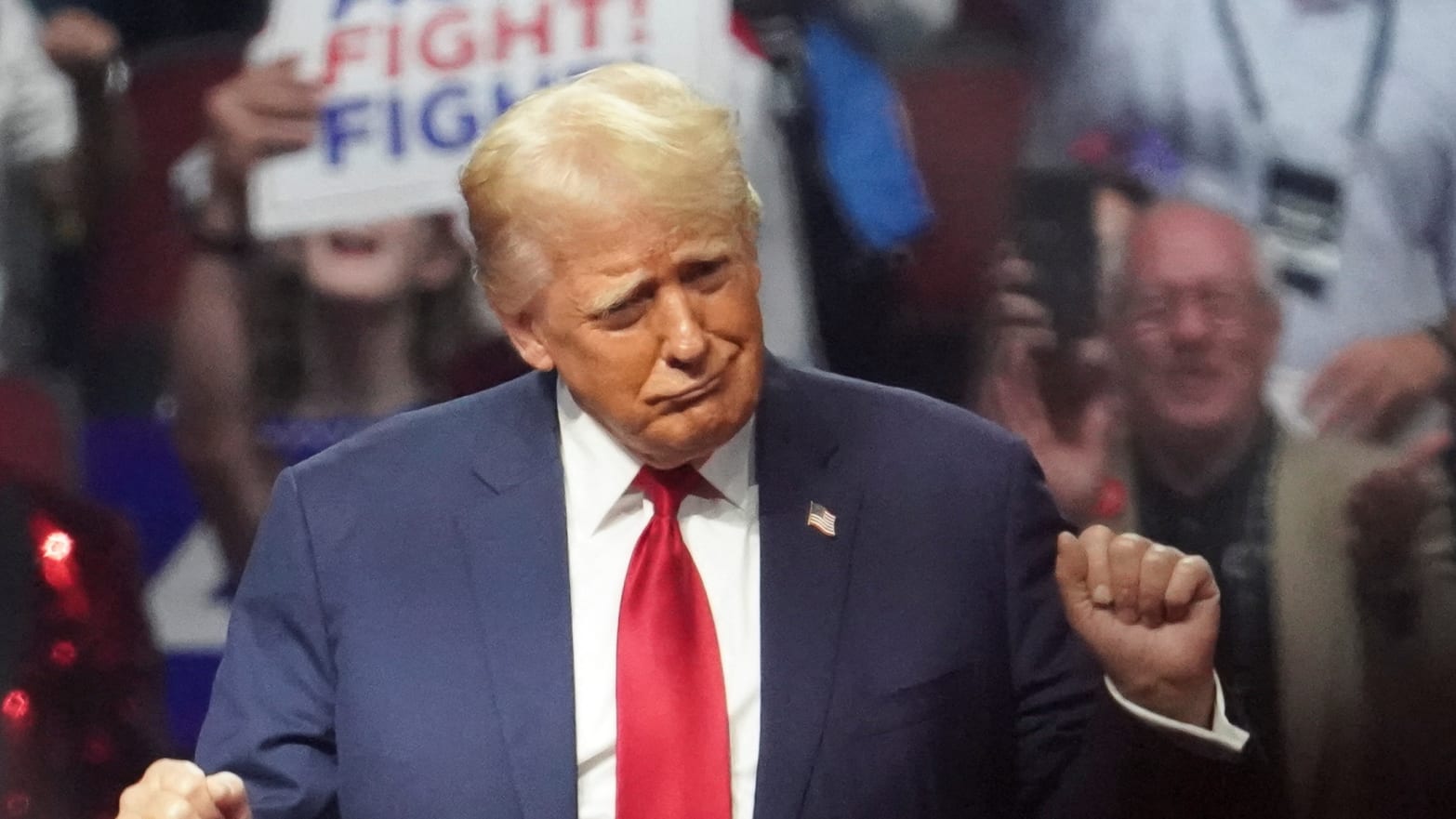 Donald Trump attends a rally in Arizona on Aug. 23