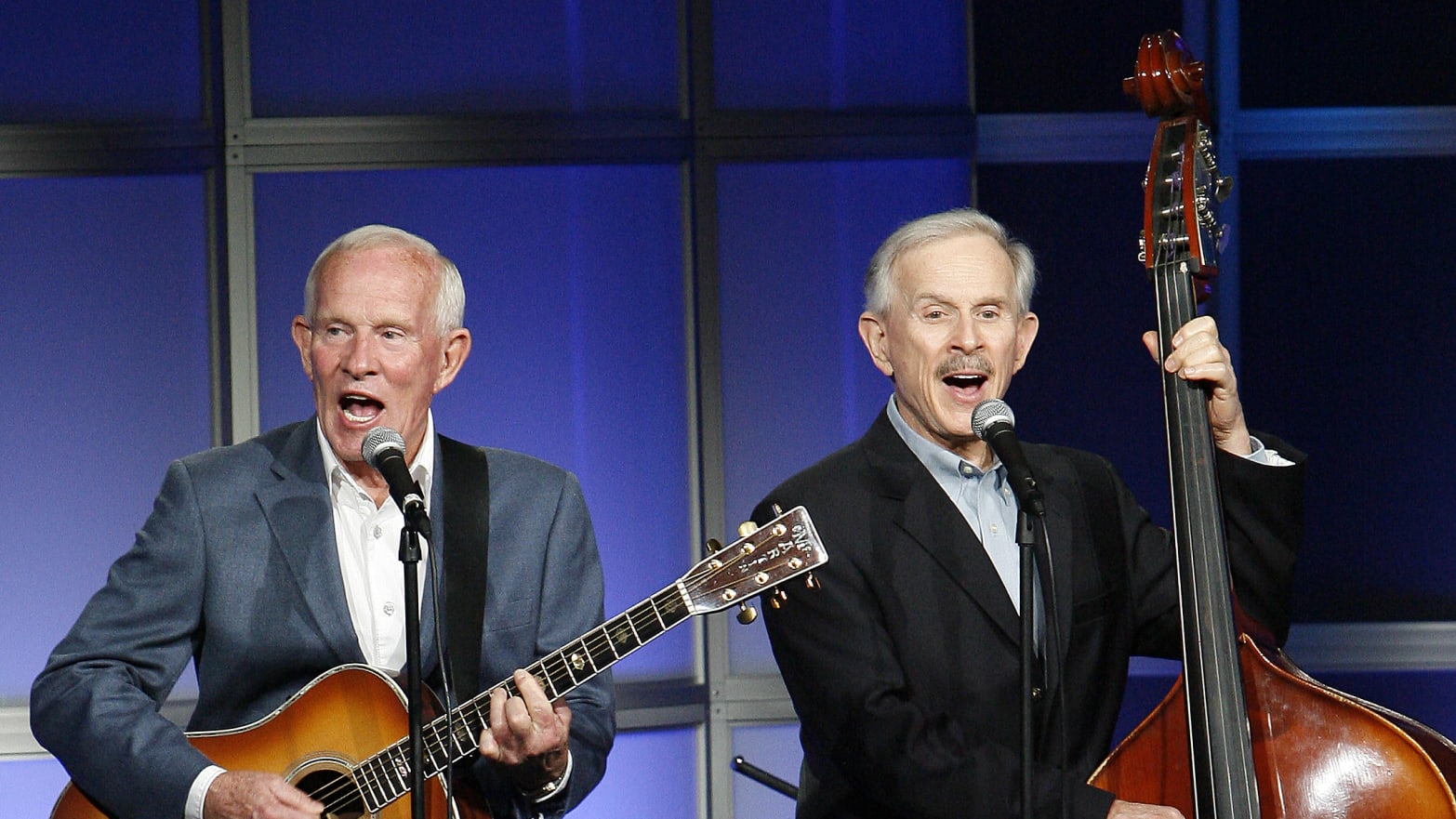 Tom Smothers (L) and Dick Smothers perform at the 24th Annual Television Critics Association Awards in Beverly Hills July 19, 2008