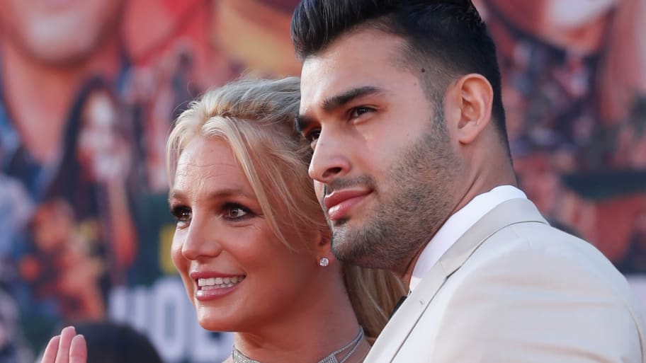 Britney Spears and Sam Asghari pose at the premiere of "Once Upon a Time In Hollywood."