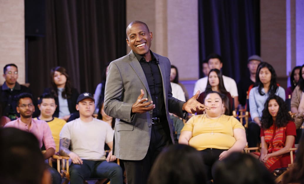 Carlos Watson records a TV debate for Take On America With OZY.