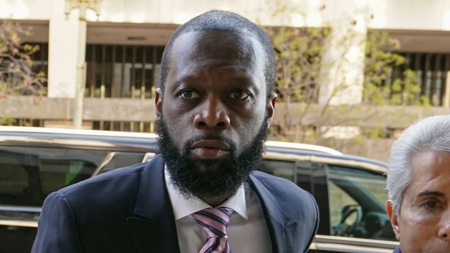 Grammy award-winning Fugees rapper Prakazrel (Pras) Michel, who is facing criminal charges in an alleged illegal lobbying campaign, arrives with his lawyer David Kenner for opening arguments/