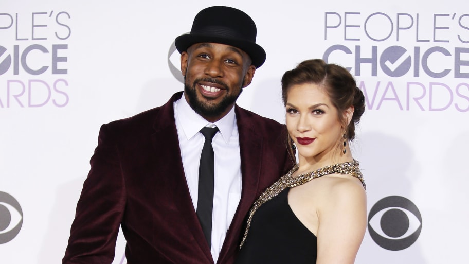 Stephen ‘tWitch’ Boss and wife Allison Holker pose on the red carpet.