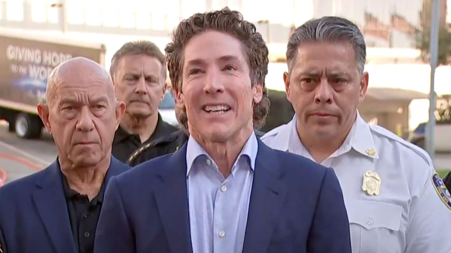 Joel Osteen holds a press conference after a shooting at his Texas megachurch