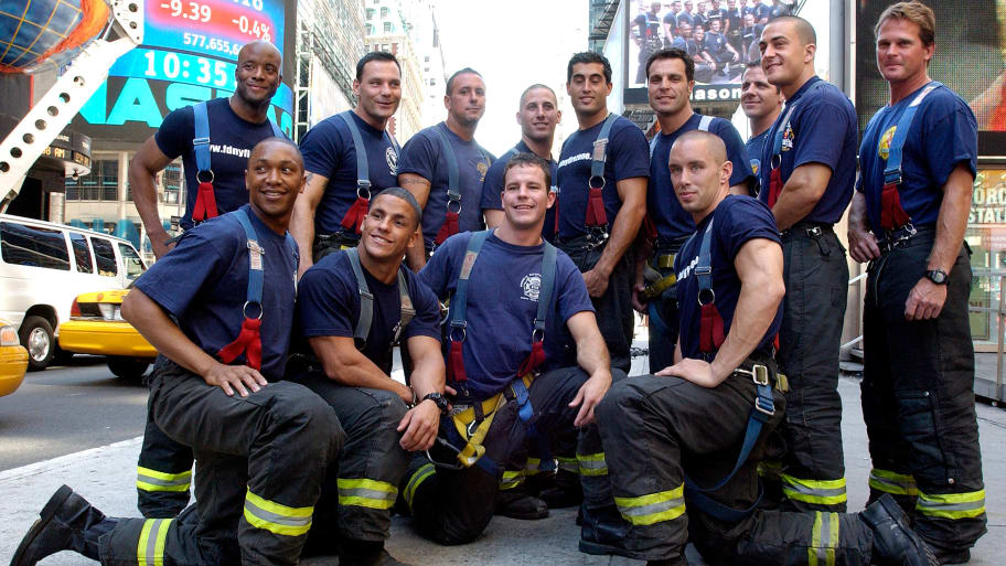New York City fire fighters pose.