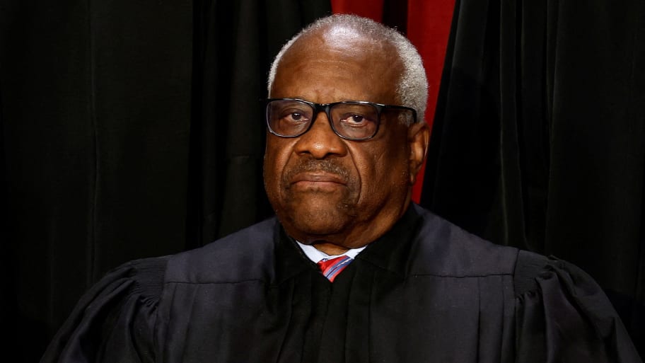 Clarence Thomas poses for a portrait inside the Supreme Court.