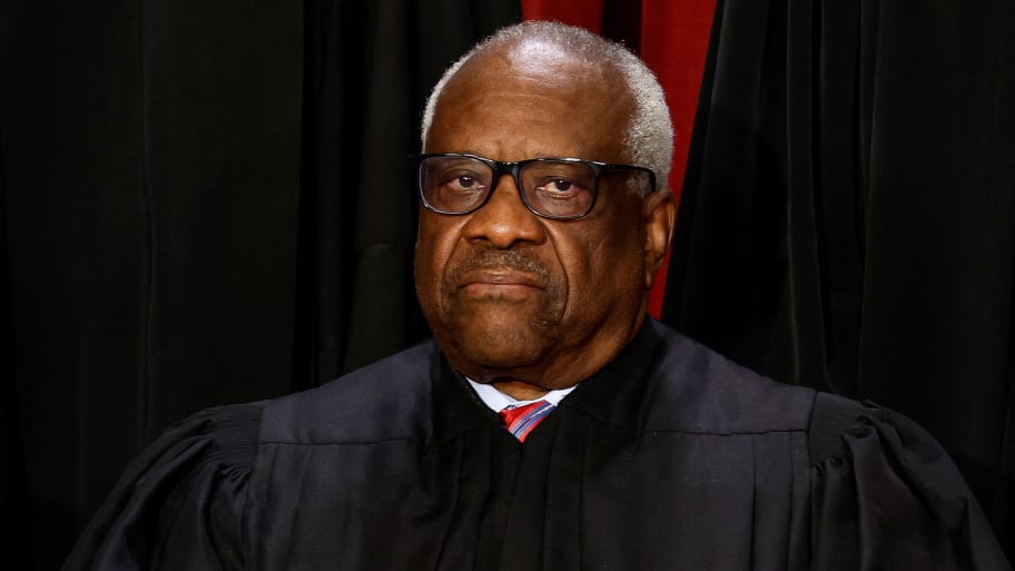 U.S. Supreme Court Associate Justice Clarence Thomas poses during a group portrait at the Supreme Court in Washington, U.S., October 7, 2022.