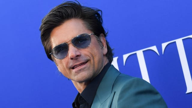 John Stamos at the world premiere of "The Little Mermaid"