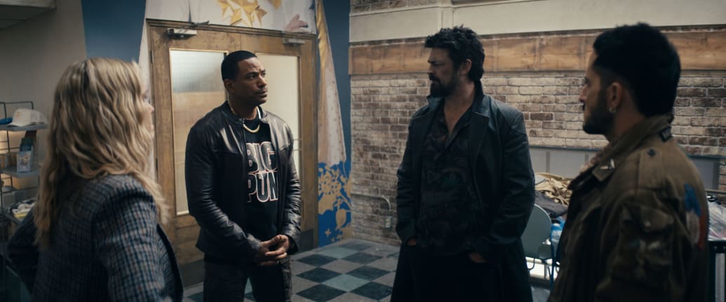 Erin Moriarty as Annie January aka Starlight, Laz Alonso as Mother's Milk, Karl Urban as Billy Butcher, and Tomer Capone as Frenchie  in The Boys Season 4.