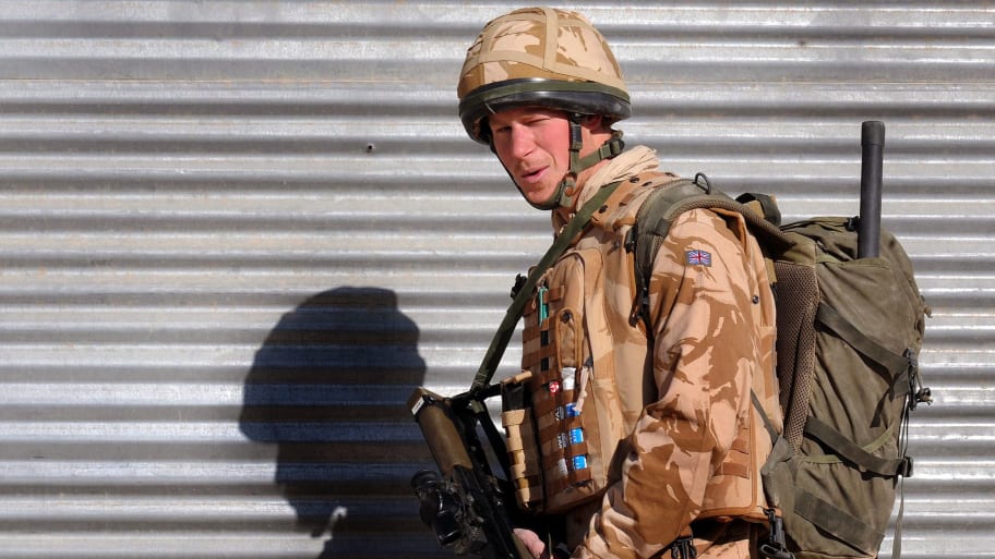 Prince Harry patrols through the deserted town of Garmisir close to FOB Delhi in Helmand province, southern Afghanistan, January 2, 2008.